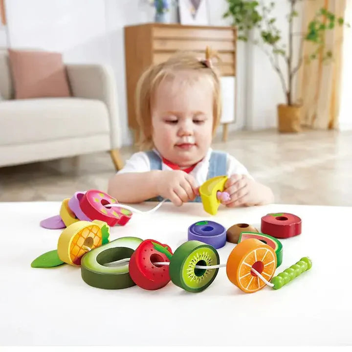 Enhebrar frutas Hape
